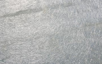 Wootton Courtenay laminate fibreglass or shingles?